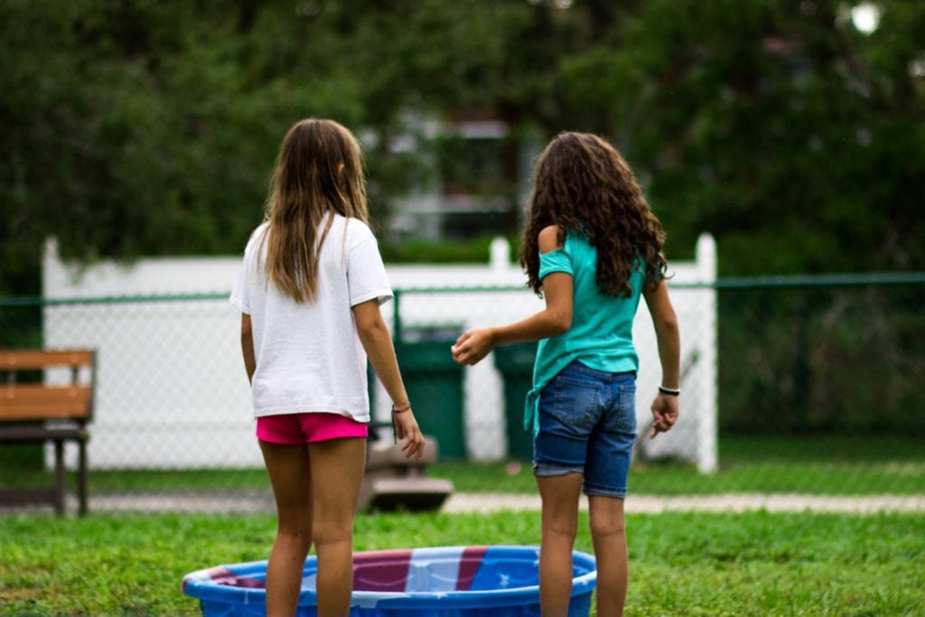kids in front of kiddie pool