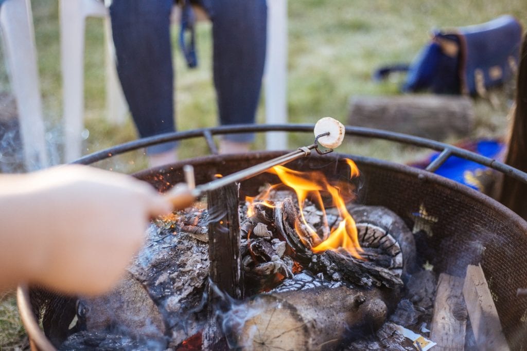 roasting marshmallow over a grill