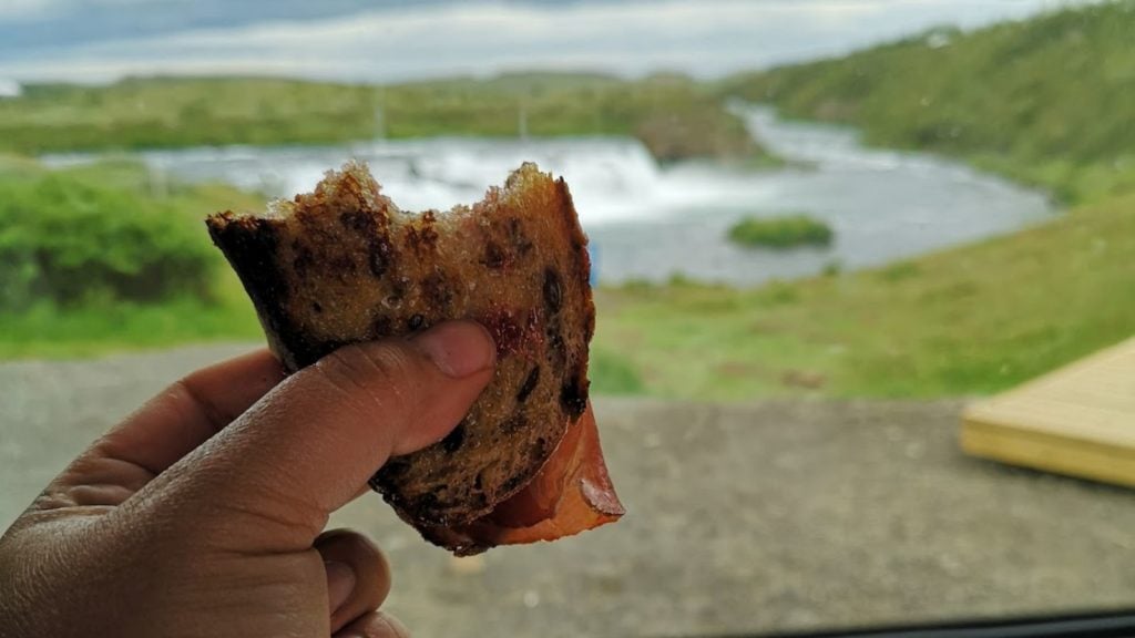 Eating grilled cheese with a waterfall view (Photo: Kerry Sainato)