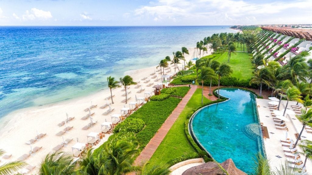 beach and pool at Grand Velas Riviera Maya, one of the best all-inclusive beach resorts 