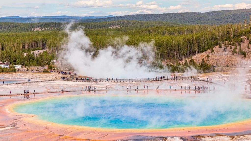Tourists at Grand Prismatic Springs in Yellowstone National Park (Photo: @joicephotography via Twenty20)