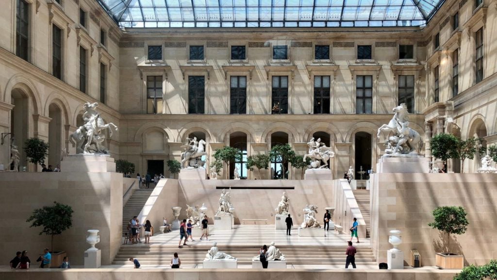 Interior of the Louvre Museum in Paris, one of the top Europe tourist attractions