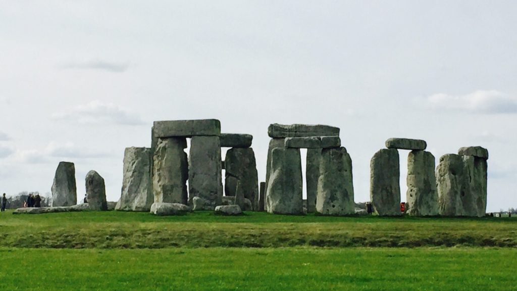 View of Stonehenge and visitors. Stonehenge is one of the top Europe tourist attractions