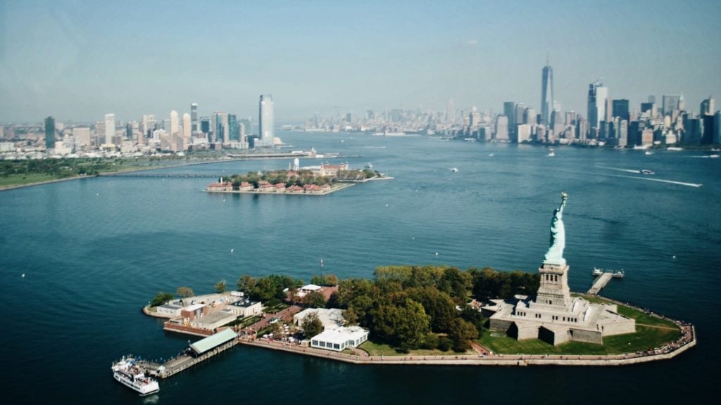 View of the Statue of Liberty and Liberty Island, two top U.S. attractions