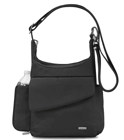 Travelon Anti-Theft Classic Messenger Bag holding a water bottle