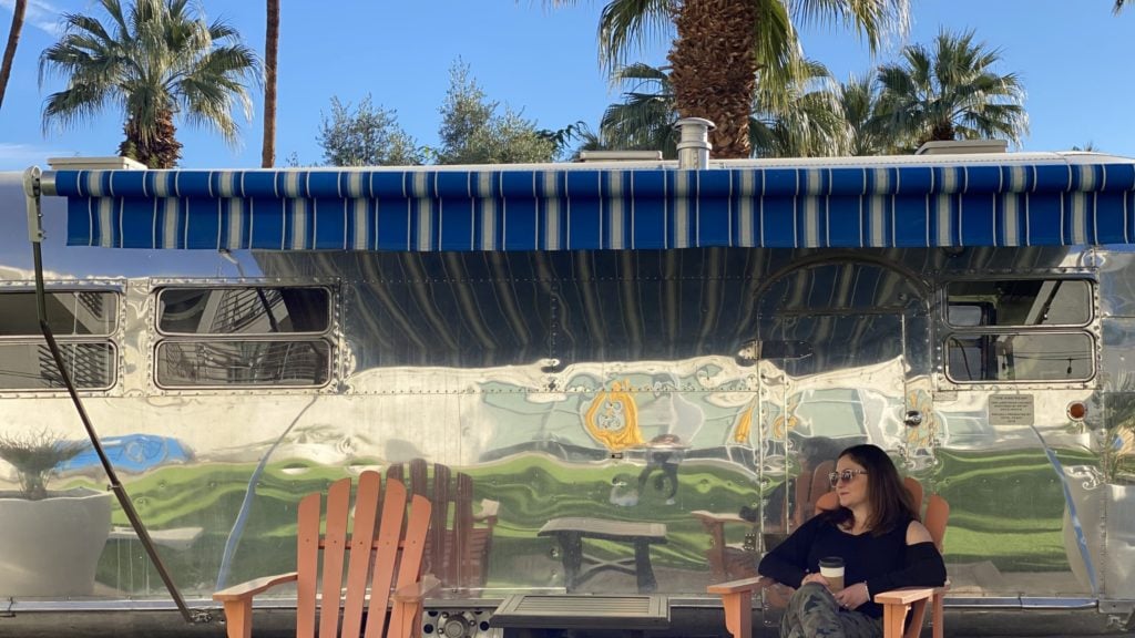 woman on girls getaway to Palm Springs relaxing with coffee