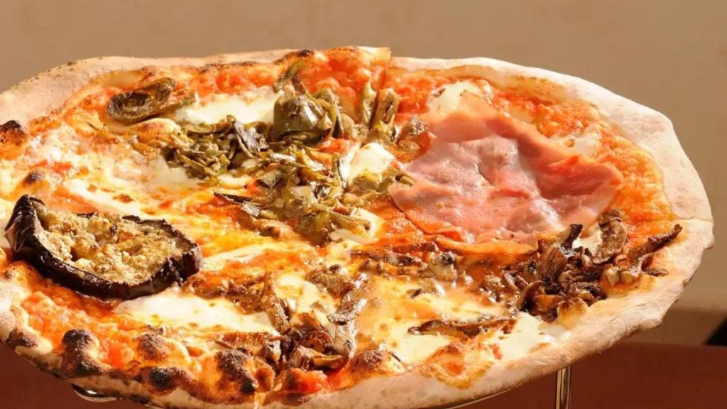 Authentic wood-fired Neapolitan-style pizza at Via Napoli Ristorante e Pizzeria (Photo: Disney)