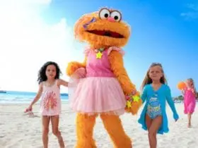 Sesame Street Characters and Kids at Beaches Negril