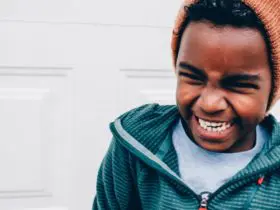 Boy laughing at funny jokes for kids (Photo: @amyhilbrand via Twenty20)