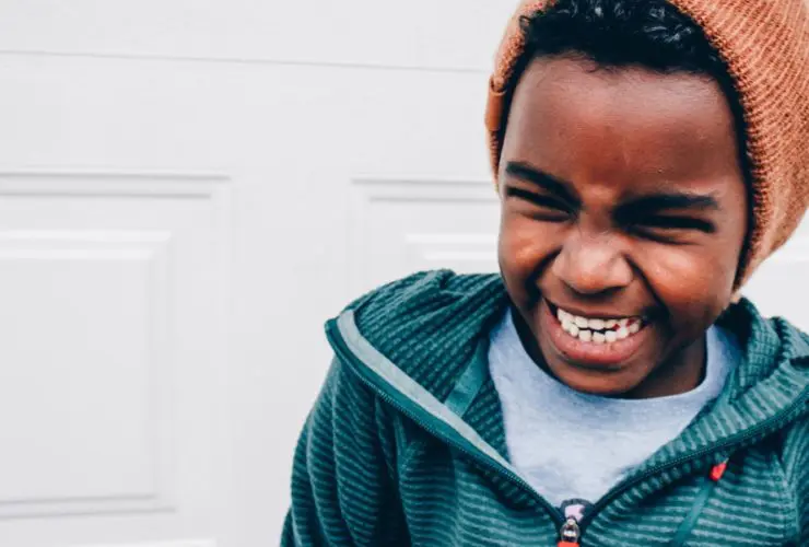Boy laughing at funny jokes for kids (Photo: @amyhilbrand via Twenty20)
