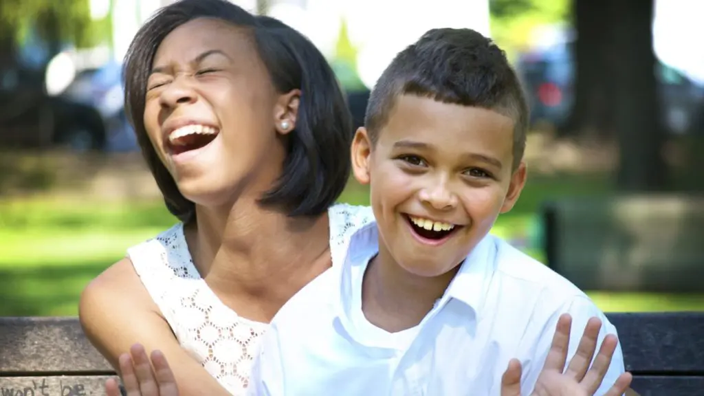 brother and sister laughing at kids jokes