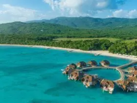 Over water bungalows at Sandals South Coast Jamaica couples resort