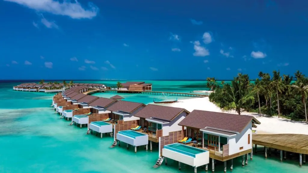 overwater bungalows at the Atmosphere Kanifushi Maldives, all-inclusive beach resorts
