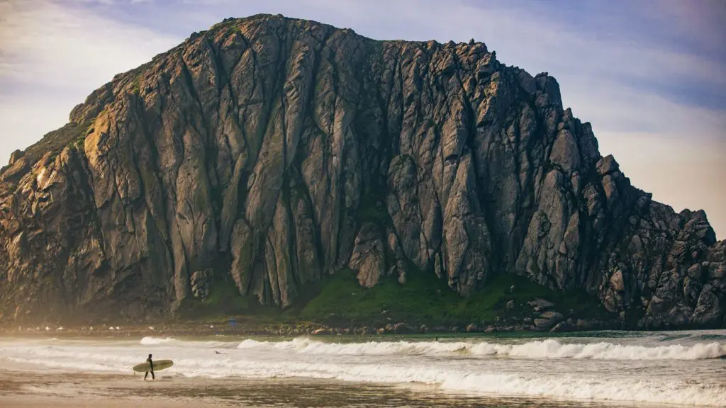 Surfer in Morro Bay, California, near Pismo Beach