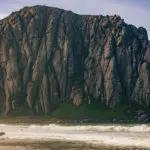 Surfer in Morro Bay, California, near Pismo Beach