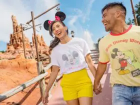 Couple holding hands at Walt Disney World (Photo: Walt Disney World)