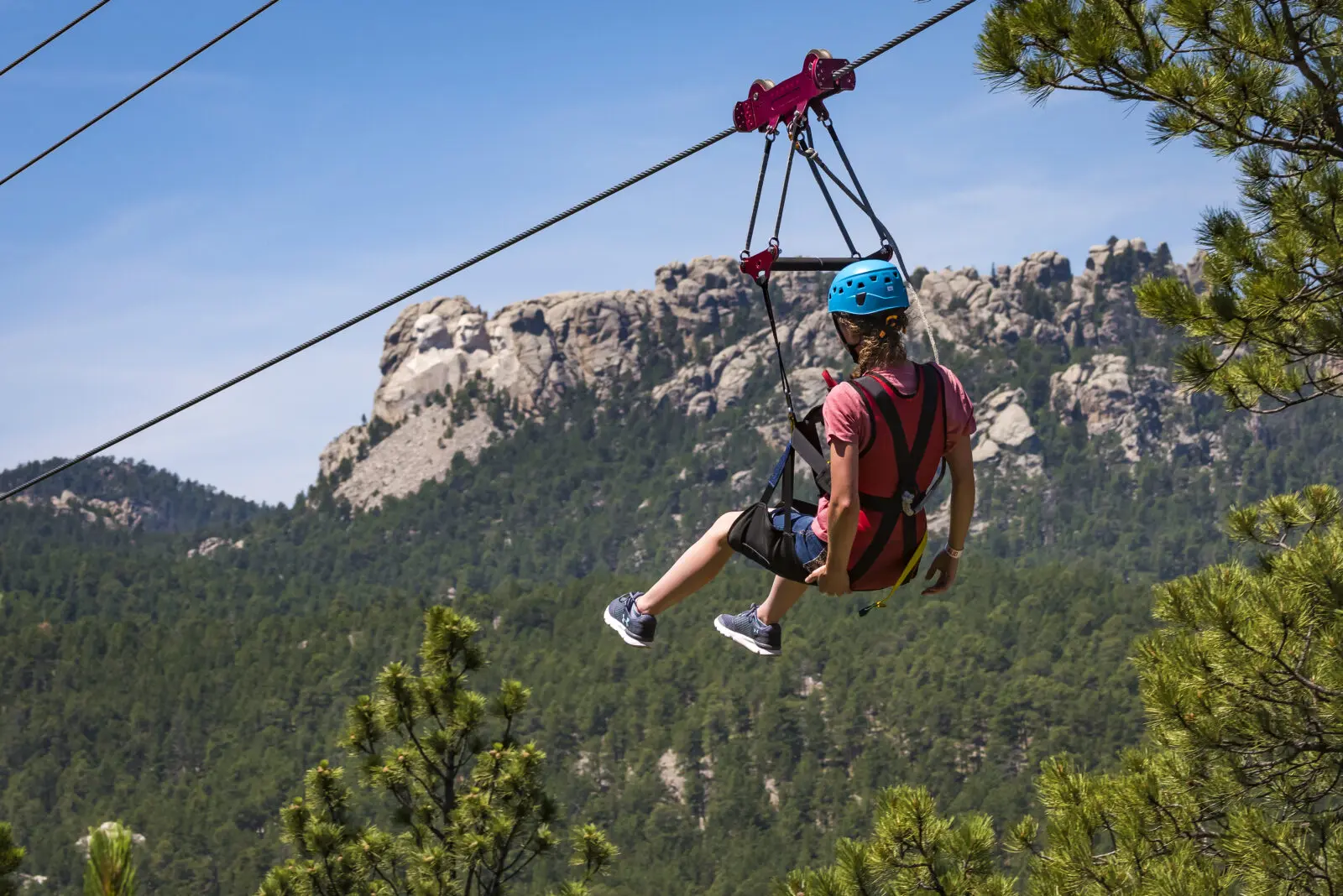 Person on the zipline at Rushmore Tramway Adventures