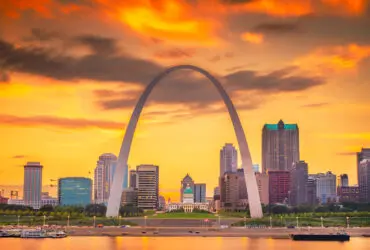 St. Louis, Missouri, USA downtown cityscape on the Mississippi River at twilight.