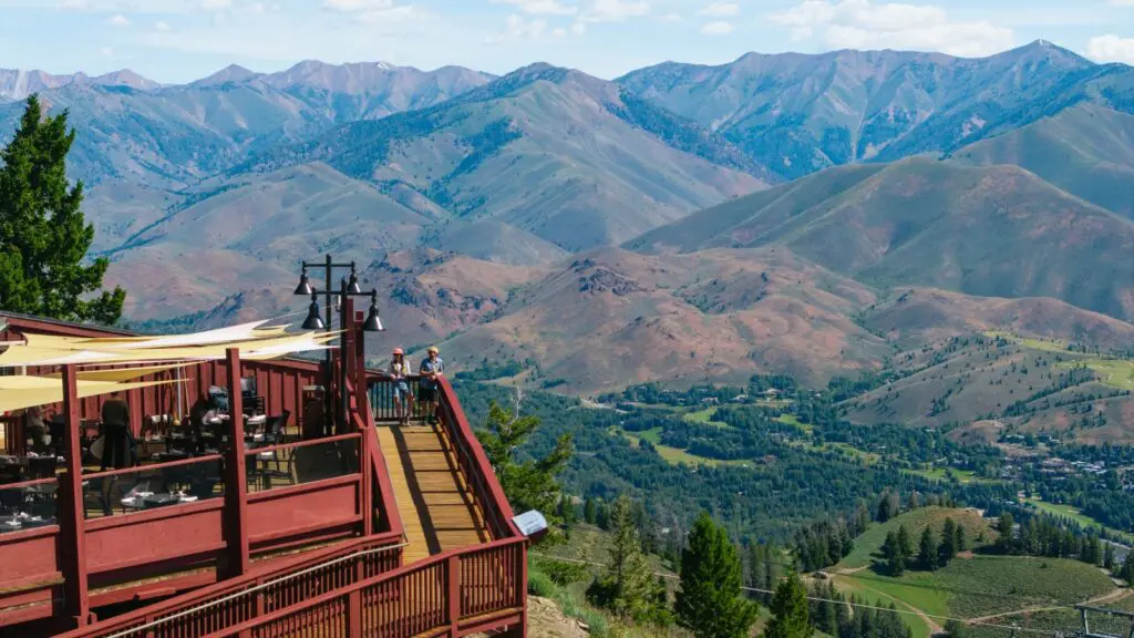Two people on the deck at the Roundhouse at Sun Valley Resort