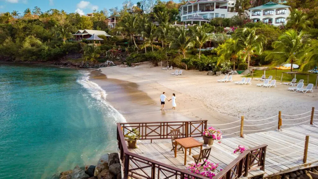 Couple on the beach in St. Lucia (Photo: Shutterstock)