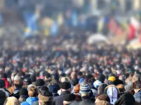 Crowd of anonymous people on street in city center (Photo: Shutterstock)