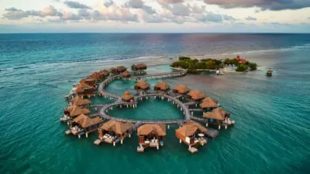An aerial view of the overwater bungalows at Sandals Royal Caribbean