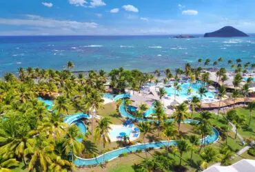 An aerial view of of the water park and beach at Coconut Bay Beach Resort and Spa