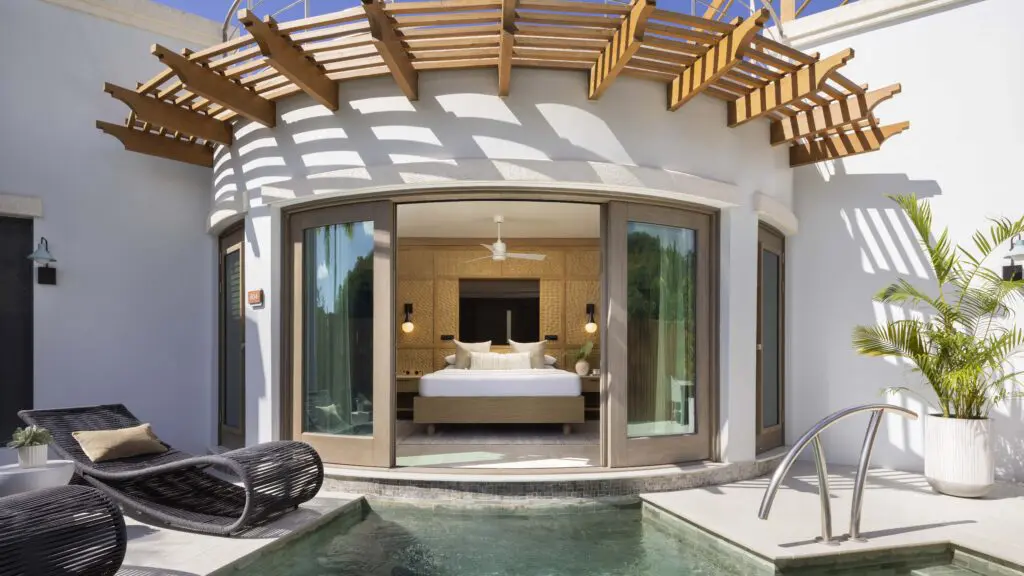 The pool area lookig into the bedroom of a Rondoval Butler Sky Villa at Sandals Regency La Toc