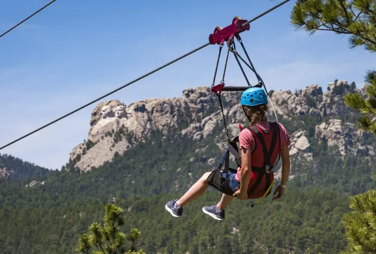 Person on the zipline at Rushmore Tramway Adventures