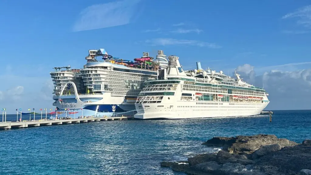 You can't fully appreciate the size of Icon of the Seas until you see it beside a typical ship (Photo: Josh Roberts)