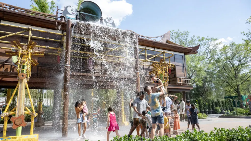 Kids playing in water play area at DreamWorks Land.