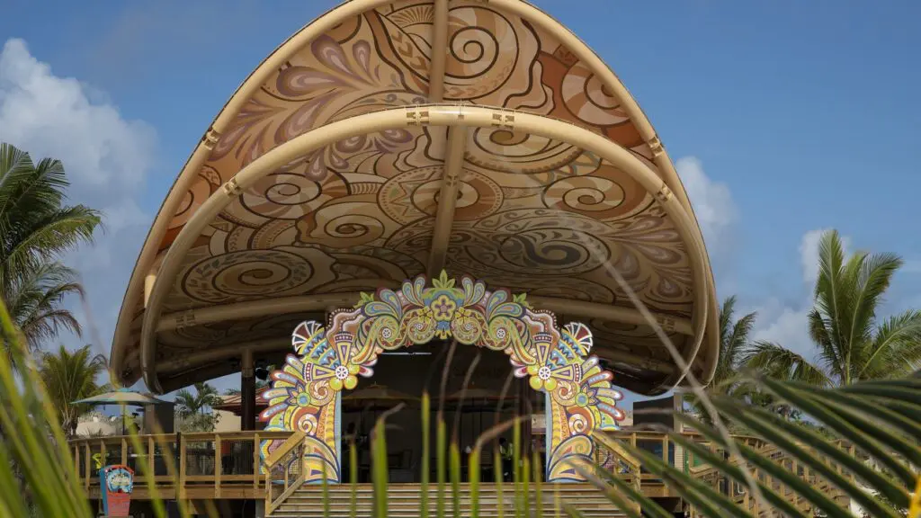 The Goombay Cultural Center at Disney Lookout Cay at Lighthouse Point on the island of Eleuthera in The Bahamas is a brilliantly colored pavilion that celebrates the rich history and culture of The Bahamas.