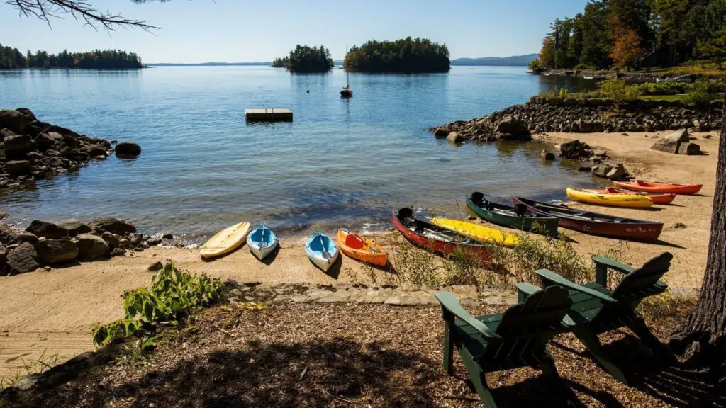 kayaks on the beach at Migis Lodge in South Casco, Maine