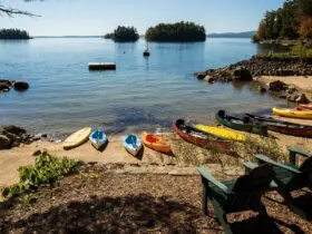 kayaks on the beach at Migis Lodge in South Casco, Maine