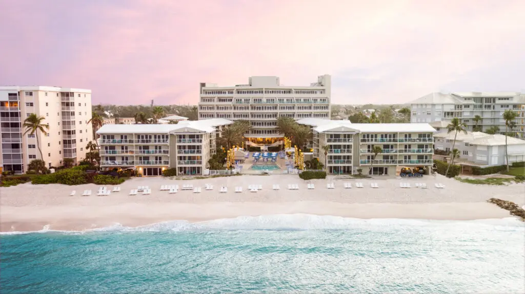 A sunrise aerial view of Edgewater Beach Hotel and the beach in front of it