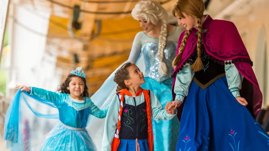 Two young girls meet actors disguised as princesses