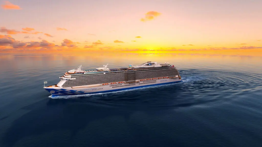 Cruise ship sailing at sunset