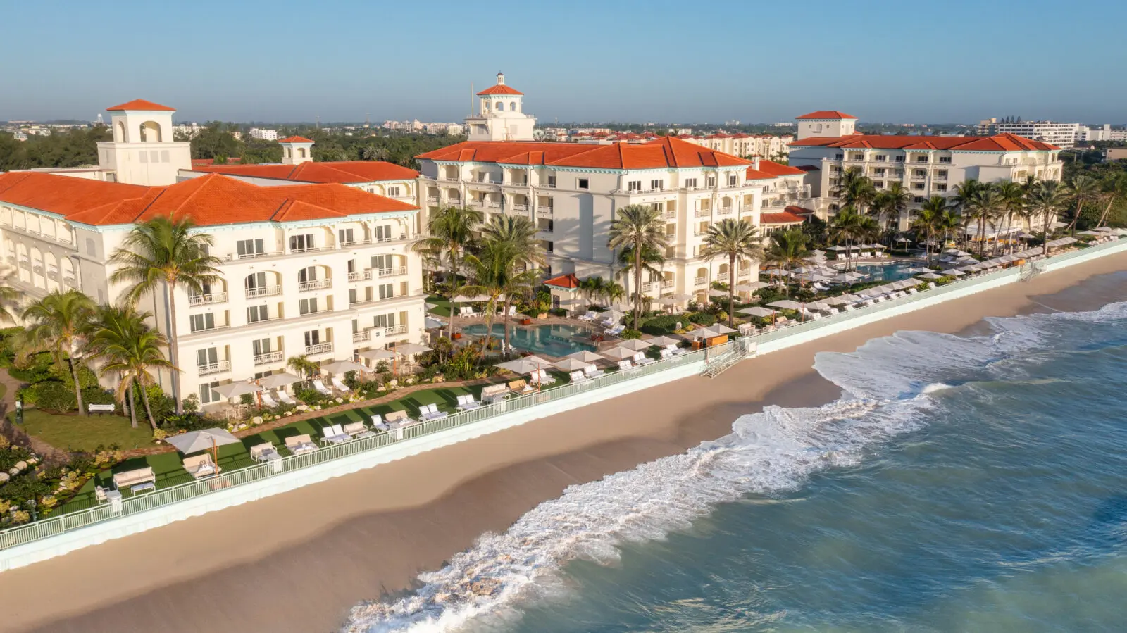 An aerial view of Eau Resort & Spa and its beach area