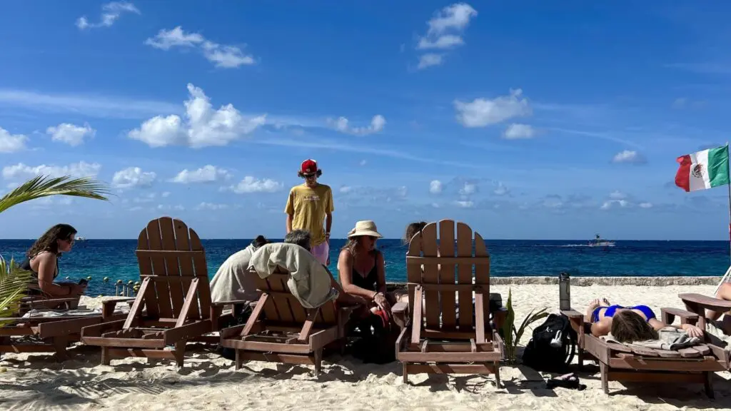 family on chairs on a Caribbean beach