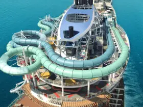 Top deck of cruise ship with two tube slides winding around