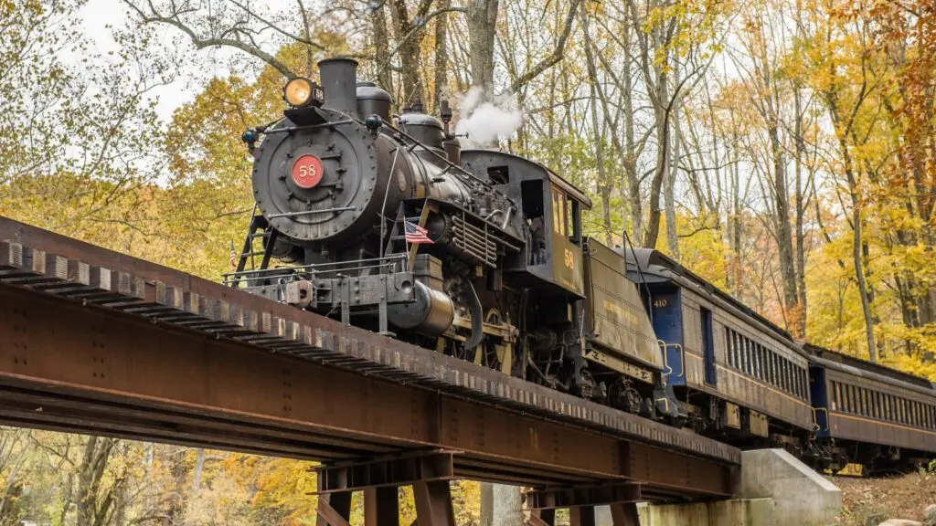 A Wilmington & Western Railroad crossing a bridge during the fall