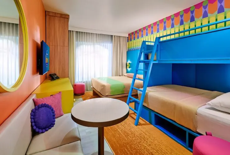 A rendering of a brightly colored guest room at Universal Kids Resort Hotel