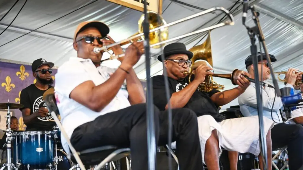Musicians play on stage during Jazz Fest in New Orleans