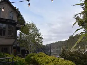 Noyo Harbor Inn exterior with Fort Bragg harbor in background