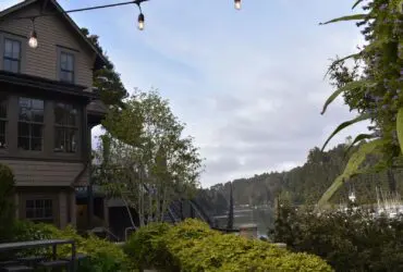 Noyo Harbor Inn exterior with Fort Bragg harbor in background