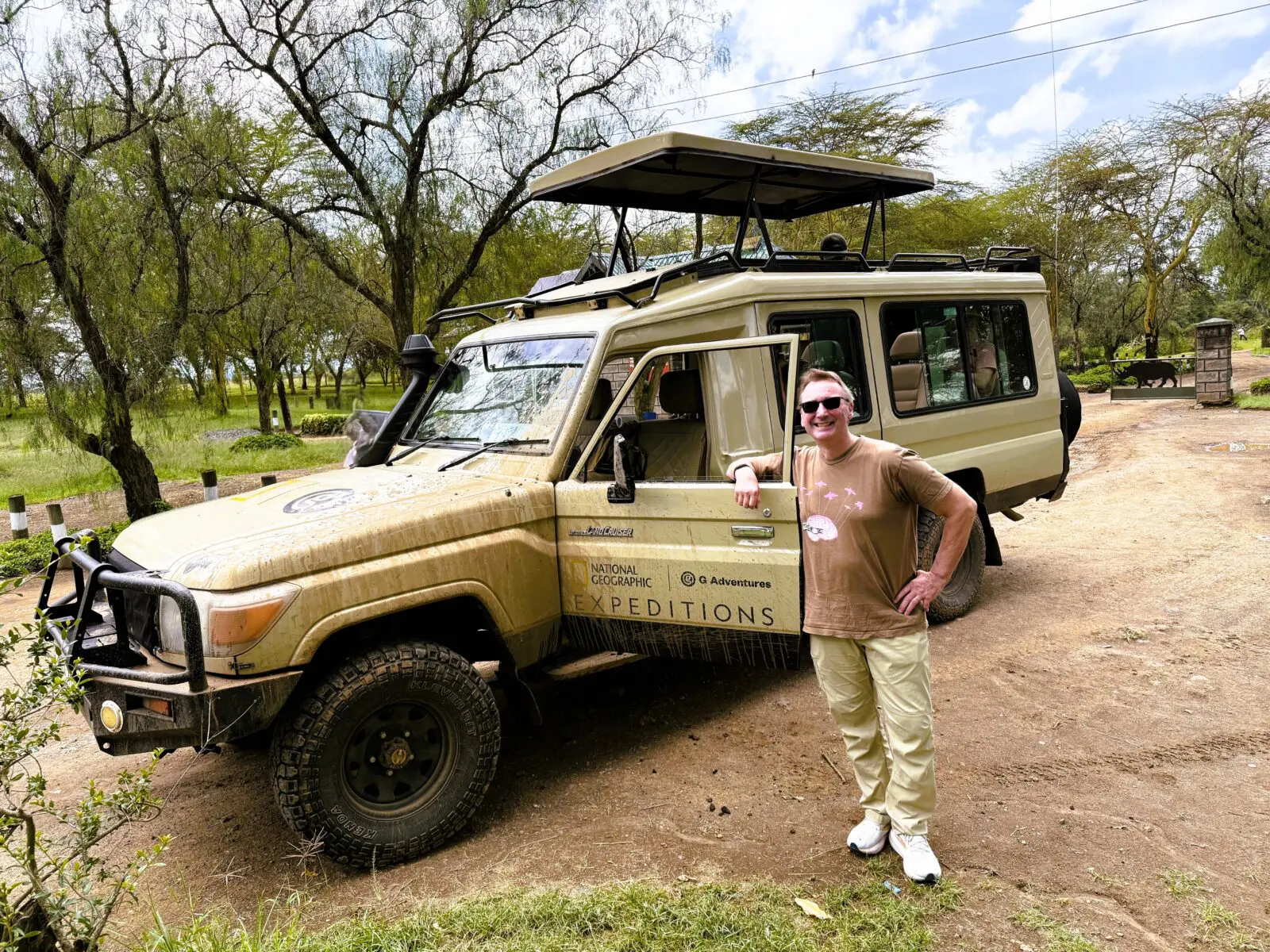 Author at the gates of Lake Nakuru National Park, Kenya (Photo: Dave Parfitt)