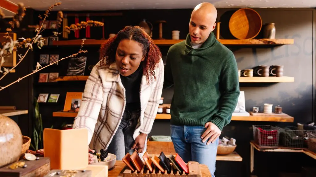 A man and woman looking at crafts in Boone, NC