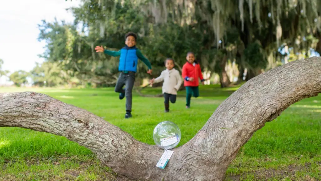 Three kids taking part in the Island Treasures event on Jekyll Island