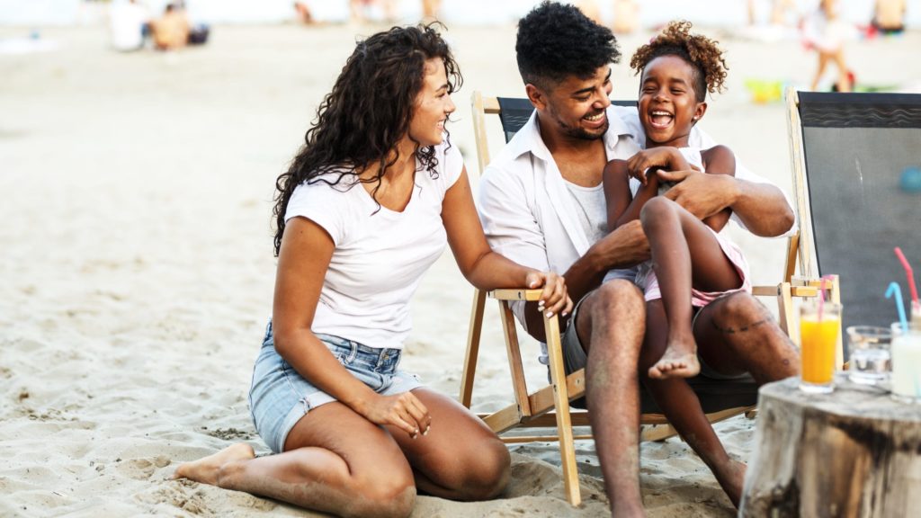 Family at beach (Photo: Shutterstock)