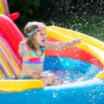 Child in inflatable pool (Photo: FamVeld/Shutterstock)